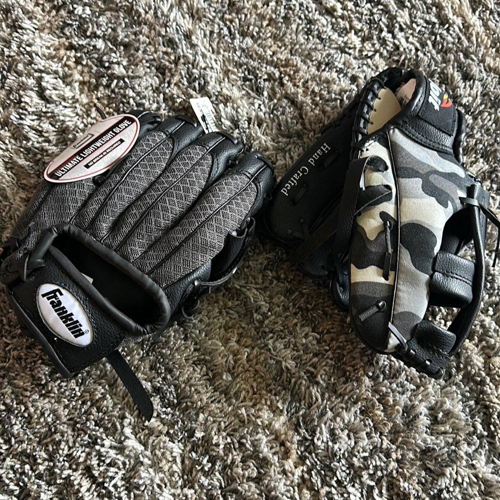 2 baseball mitts brand new 1 with tags.